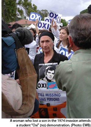 photo of old woman atdemonstration against unification