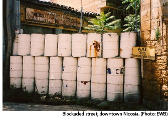 Photo of oil drums blockading a street in Greek Nicosia